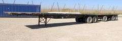 M-1463  1984 & 1989 Set of Doubles Flatbed Trailers