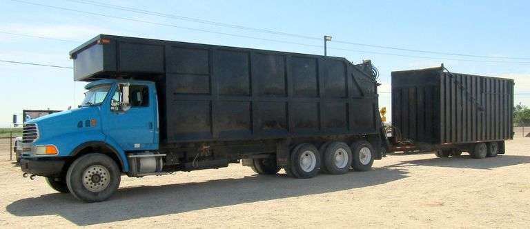 H-1040 2006 Sterling Grapple Truck W/ Custom 50 Yard Dump Trailer
