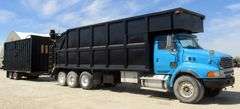 H-1040 2006 Sterling Grapple Truck W/ Custom 50 Yard Dump Trailer