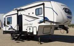 H-1005  2024 Forest River Artic Wolf Travel Trailer
