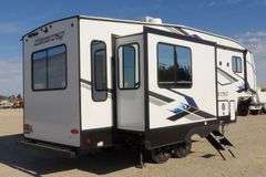 H-1005  2024 Forest River Artic Wolf Travel Trailer