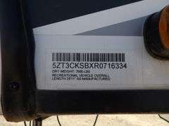 H-1005  2024 Forest River Artic Wolf Travel Trailer