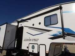 H-1005  2024 Forest River Artic Wolf Travel Trailer