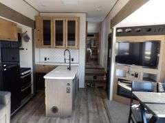 H-1005  2024 Forest River Artic Wolf Travel Trailer