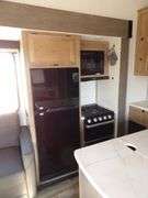 H-1005  2024 Forest River Artic Wolf Travel Trailer