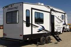 H-1005  2024 Forest River Artic Wolf Travel Trailer