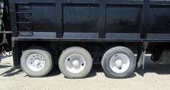 H-1040 2006 Sterling Grapple Truck W/ Custom 50 Yard Dump Trailer