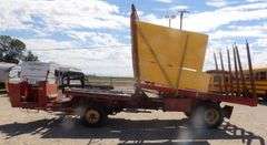 H-1180 New Holland 1049 Bale Wagon
