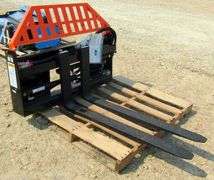 A-211  Unused Wolverine Hydraulic Skid Steer Pallet Forks