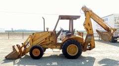 A-313  Case 580K Backhoe Loader