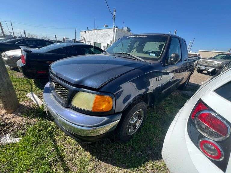 TITLE  - 2004 FORD  F-150 HERITAGE
