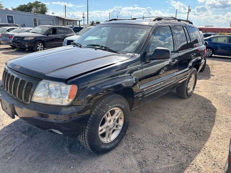 Title - 1999 JEEP  GRAND CHEROKEE