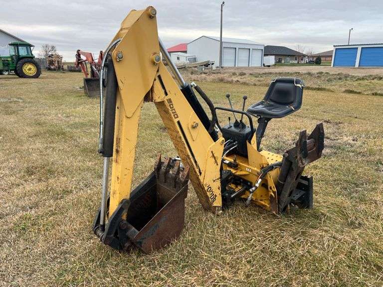 Woods 9000 Skid Steer Back Hoe Attachment