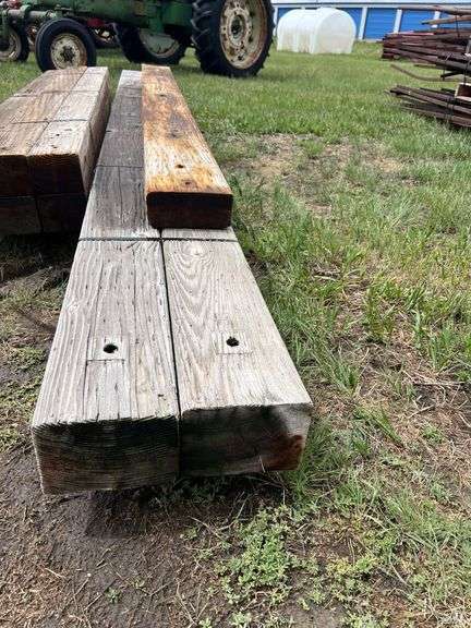 Used 5.5” x 7.5” x 14’ Wood Posts - Peterson Land & Auction LLC