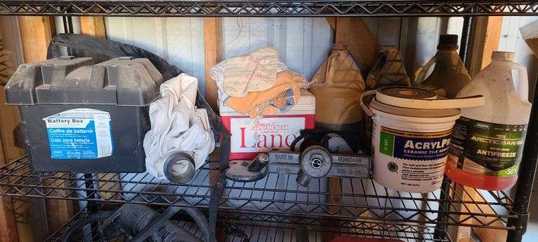 Contents of Shelf: Antifreeze, Battery Box, Mini Cooler, More