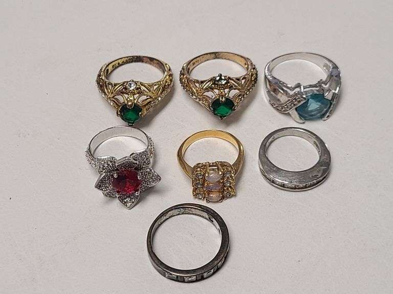 7) Rings - Prime Time Auctions, Inc.