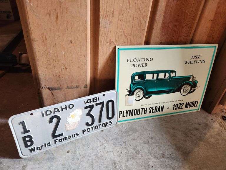 License Plate and Plymouth Sedan 1932 Sign