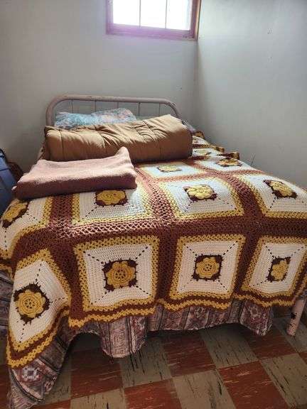 Metal Framed Queen Bed with Blankets