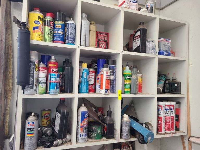 Contents of Cubbies: Hitch Attachments, Degreaser, Oils, More