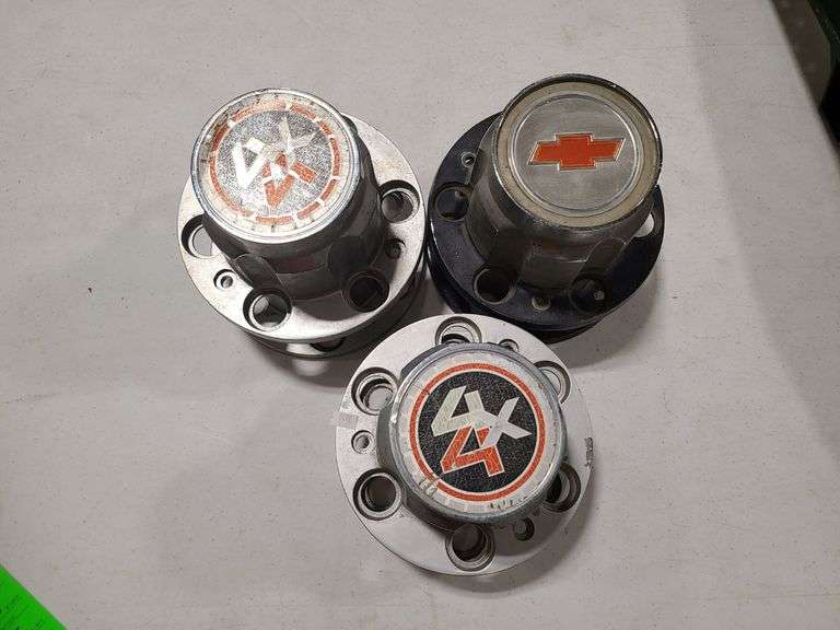 3) Chevy 4x4 Wheel Covers - Prime Time Auctions, Inc.