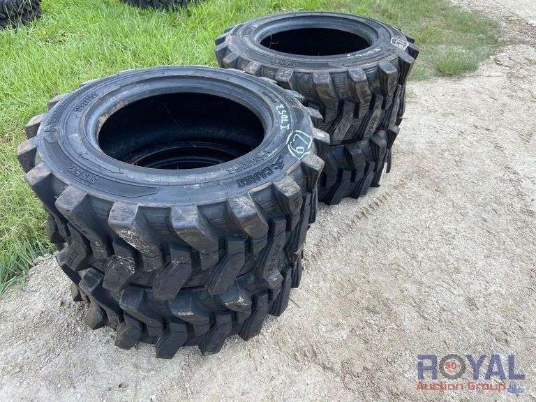 Set of Four Unused 10-16.5 Skid Steer Tires