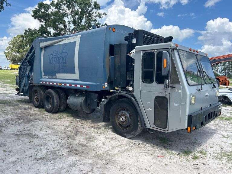 2013 Crane Carrier Co. Low Entry Loadmaster Excel-S 25 Yard Rear Loader Garbage Truck