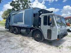 2013 Crane Carrier Co. Low Entry Loadmaster Excel-S 25 Yard Rear Loader Garbage Truck