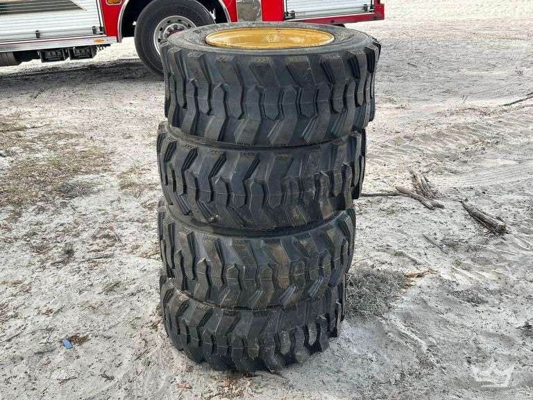Set of 4 Unused ForeRunner 12-16.5N.H.S. Skid Steer Wheels and Tires
