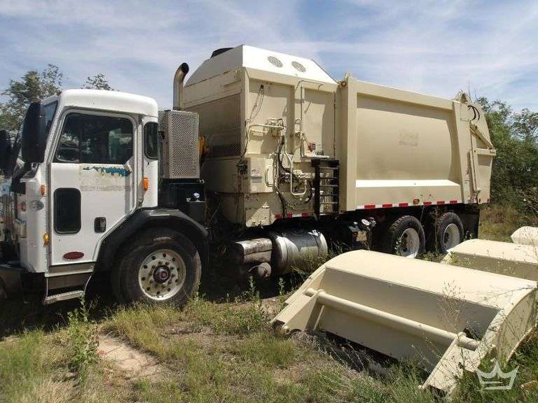 2016 Peterbilt 320 T/A Side Loader Garbage Truck