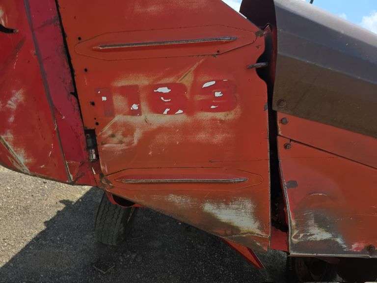 Massey 750 Combine w/ corn & grain heads