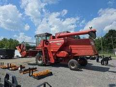 Massey 750 Combine w/ corn & grain heads