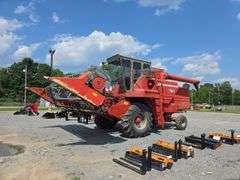 Massey 750 Combine w/ corn & grain heads