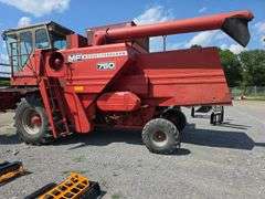 Massey 750 Combine w/ corn & grain heads