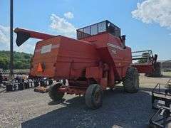 Massey 750 Combine w/ corn & grain heads