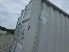 40' High Cube Container w/ 2 side doors - has some damage to the outside and one hole