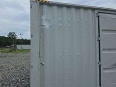 40' High Cube Container w/ 2 side doors - has some damage to the outside and one hole
