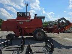 Massey 750 Combine w/ corn & grain heads