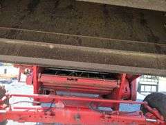 Massey 750 Combine w/ corn & grain heads