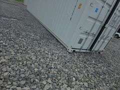 40' High Cube Container w/ 2 side doors - has some damage to the outside and one hole