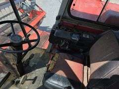 Massey 750 Combine w/ corn & grain heads