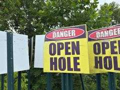 (32) Open Hole Signs and Posts