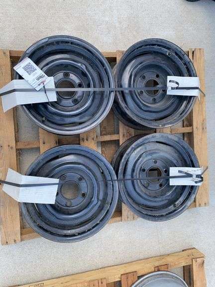 (4) Black Steel Auto Rims - RES Auction Services