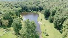 Absolute Stark County Brick Home and Recreational Real Estate Auction