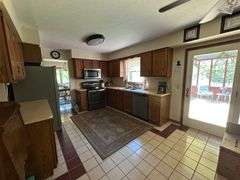 Absolute Stark County Brick Home and Recreational Real Estate Auction