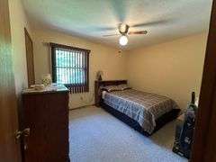 Absolute Stark County Brick Home and Recreational Real Estate Auction