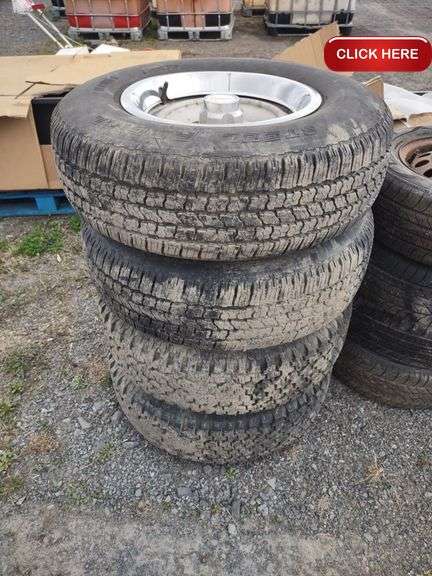 4 - 235/75/15 tires on rims - Rideau Auctions