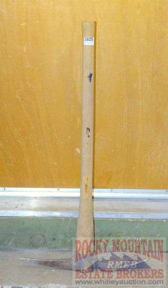 Pickaxe /w wooden handle.