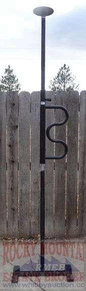 Black Metal Support Pole. - Rocky Mountain Estate Brokers Inc.