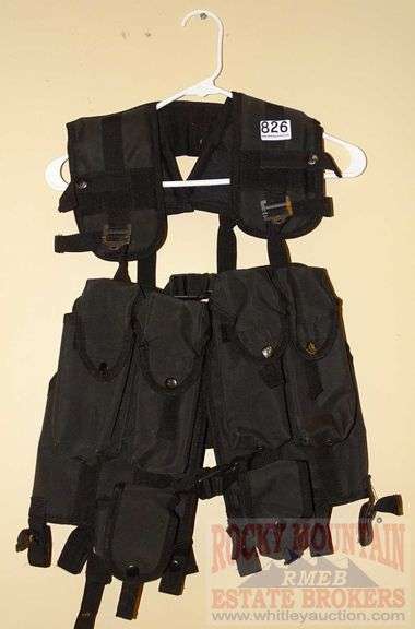 Black Nylon Tactical Vest W/ Lots of Pockets & Straps.