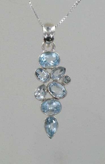 Bobby Duggal Designs, Modern Style Sterling Silver & Cascading Blue Topaz Pendant.